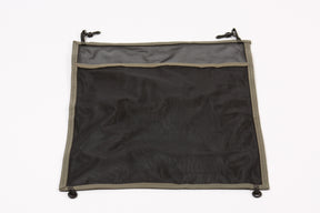 Black mesh storage bag with olive green trim, durable material for organizing essentials.