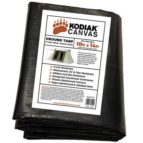 Kodiak Canvas heavy-duty ground tarp, 10ft x 14ft, 11-mil thick, waterproof, UV-resistant with reinforced corners.