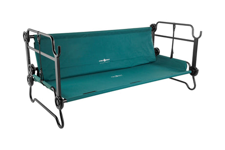 Green collapsible camping cot with a sturdy black metal frame and comfortable fabric for outdoor use.