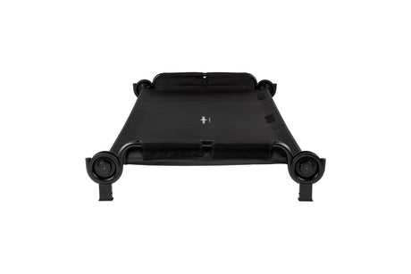 Black folding cot with sturdy metal frame and durable fabric for camping or guest use.