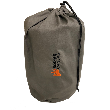 Kodiak Canvas durable gray storage bag with drawstring, ideal for camping gear or outdoor equipment.