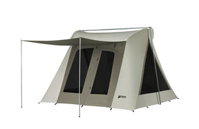 Kodiak Canvas tent in tan with a large entrance and mesh windows, perfect for outdoor camping.