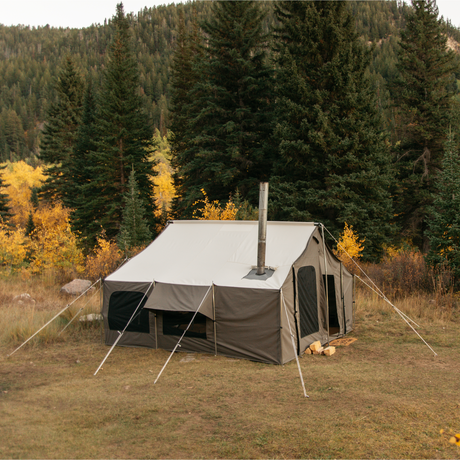 lifestyle image of a 12x12 cabin lodge tent in the woods