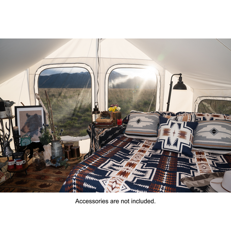 glamping tent interior spacious cabin layout with tall ceilings and windows