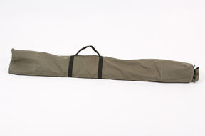 Olive green carrying bag with handle, suitable for outdoor equipment storage and transport.