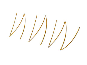 Set of six curved golden embroidery needles with sharp tips for precise stitching.