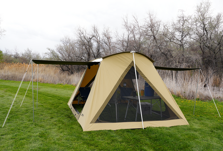 Spacious beige camping tent with mesh windows and awning, perfect for outdoor adventures.