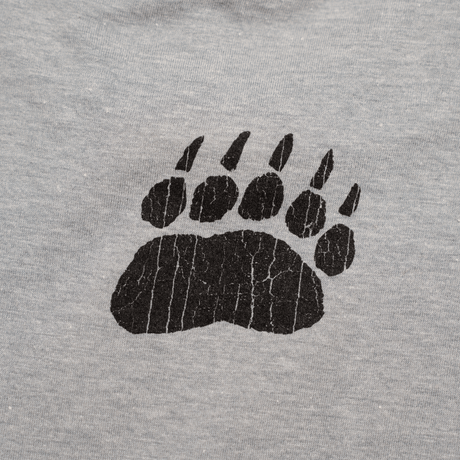 Gray t-shirt featuring a black cracked bear paw print design, perfect for wildlife lovers.